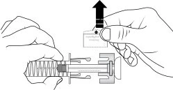 Two hands holding a medical device with a square protective cap being removed upward