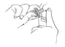 Two hands holding and manipulating a medical device for the