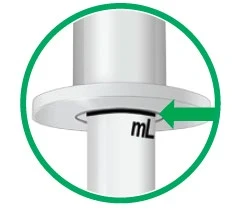 Detail of a white cylindrical container showing 'mL' marking and a green arrow pointing to a black measurement line