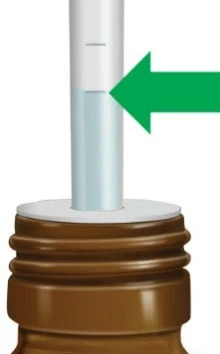 A green arrow indicates the level of blue liquid in the