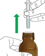 A hand holds a syringe above a brown vial with a green arrow pointing toward the