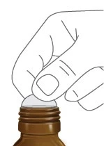 A hand holding the cap of a brown vial to open or close it, with fingers pressing on the top of the container