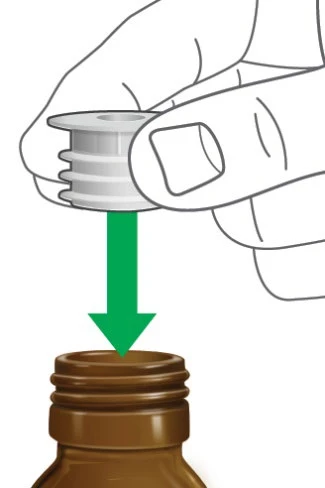 A hand holds a white cap being pressed downward with a green arrow pointing toward the