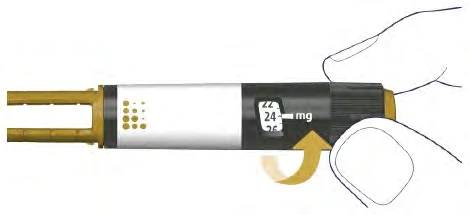 Una mano gira la parte terminal negra de un dispositivo médico para mostrar la dosis de 24 mg en una pantalla digital