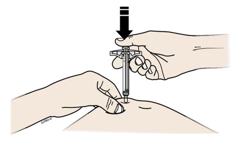 Two hands hold a syringe to insert it vertically into the skin of the abdominal area with a black arrow indicating downward pressure