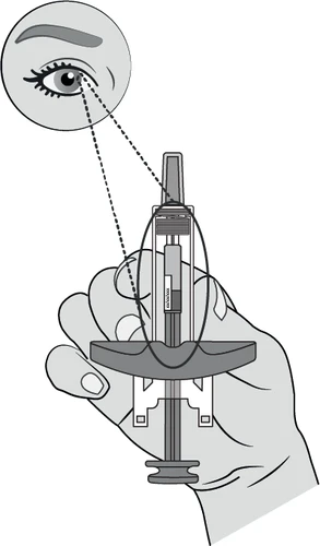 Technical drawing showing a hand holding a syringe with a close-up of the