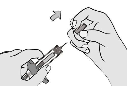 Two hands handling a syringe with a needle and a small protective cap, with an arrow indicating the removal motion