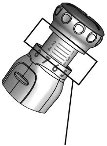 Dibujo técnico en blanco y negro de un dispositivo médico cilíndrico con escala graduada numerada del 2 al 9 y botones en la parte superior