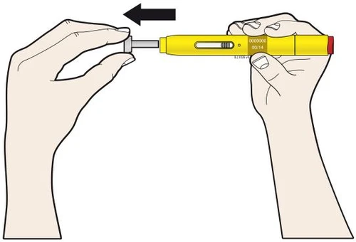 Dos manos sostienen un dispositivo médico amarillo y agarran una parte terminal hacia la izquierda siguiendo la dirección de una flecha negra