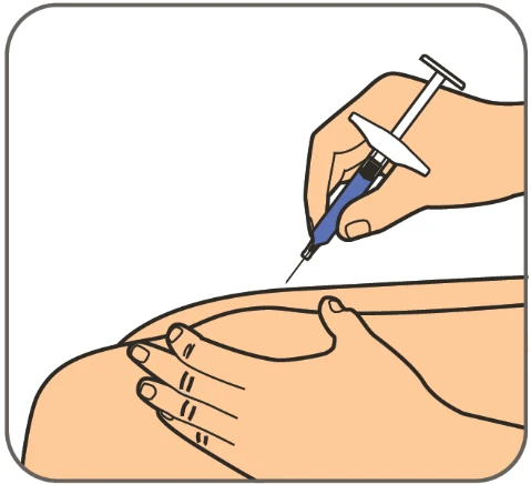 A hand holds a syringe with needle ready for use