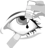 A hand holding an eye drop bottle pouring a drop directly into the