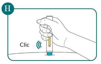 Una mano sostiene un dispositivo médico cilíndrico presionándolo contra una superficie plana con la palabra Clic que indica un sonido mecánico