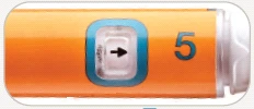 Detail of an orange medical device with a white square containing a black arrow pointing right and the number 5 in blue beside it