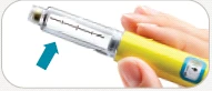 A hand holding a yellow and transparent cylindrical medical device with a blue arrow pointing to the upper part of the container