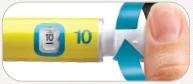 Fingers rotating the white part of a yellow medical device with number 10 displayed digitally to adjust the dose