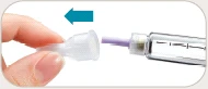 A hand holding a transparent plastic cap while detaching it from a needle inserted in a syringe, indicated by a blue arrow pointing left