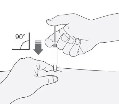 A hand holding a syringe vertically at a 90-degree angle while the
