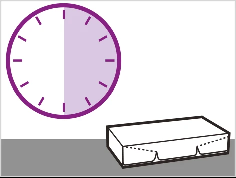 Purple circular clock with white background and right half in lavender color next to a white rectangular box on a gray surface