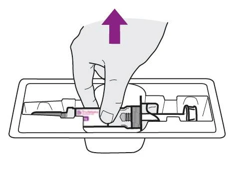 A hand lifts a horizontal syringe from a white rectangular container with a purple arrow pointing toward it