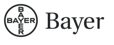 Logo firmy Bayer składające się z okręgu z napisem Bayer ułożonym pionowo i poziomo obok słowa Bayer w czcionce szeryfowej