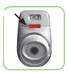 Gray medical device with a digital display reading 60 and a red button indicated by a black arrow on a white background with a green border