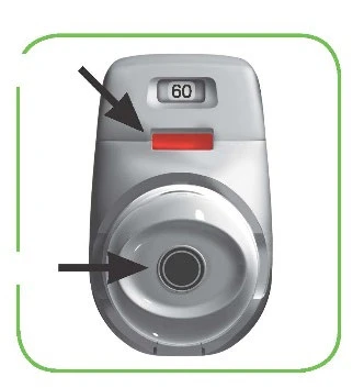 White medical device with a digital display reading 60, a red button, and a black arrow indicating the direction