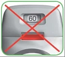 Medical device with a digital display reading 60 and a red button, crossed out by a large red prohibition sign
