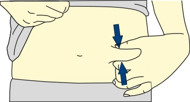 Two hands pinching the skin of the injection site