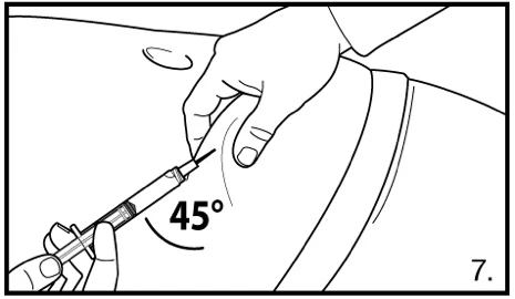 A hand holds a syringe and inserts the