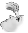 A hand holding a dropper bottle to apply drops directly into the eye
