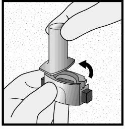 Two hands rotating a cylindrical cap downward to attach it to the base of a circular medical device