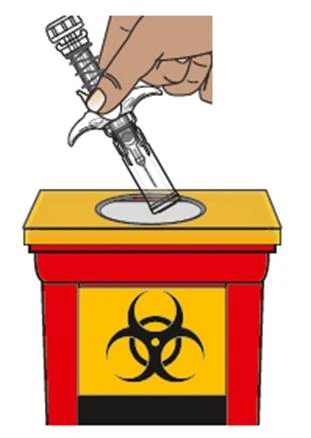 A hand holds a transparent medical device to insert it into a red and yellow container with biohazard symbol