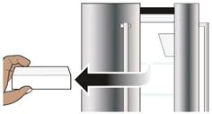 A hand holds a white container while a black arrow indicates the insertion movement toward the