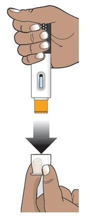 A hand holds a black and white medical device while a black arrow indicates downward movement toward a