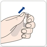 Una mano sostiene verticalmente un pequeño frasco de vidrio con un tapón blanco mientras una flecha azul indica el movimiento hacia la