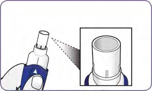 Detalle ampliado de la parte superior de un dispositivo médico blanco con un