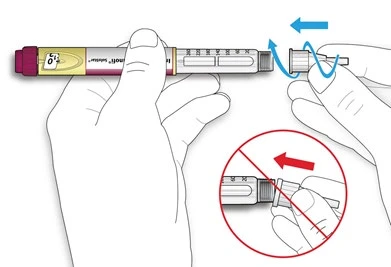Dos manos sujetan una pluma inyectable para girar la parte superior hacia la izquierda, con un símbolo de prohibición sobre una rotación incorrecta