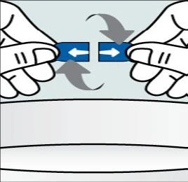 Two hands holding two parts of a blue device, with gray arrows indicating a separating motion