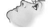 Black and white drawing of a human face profile with a medical device applied to the cheek near the