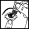 A hand holding a dropper above the eye