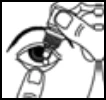 A hand holding a container to apply eye drop solution into the eye