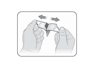 Two hands grasping and tearing apart a white plastic pouch laterally, indicated by an upward double-headed arrow