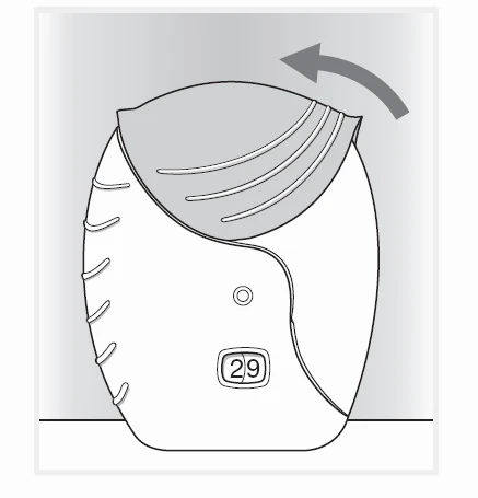 Dibujo técnico de un dispositivo médico blanco con un contador digital que marca 29 y una flecha curva que indica el movimiento de rotación hacia adelante