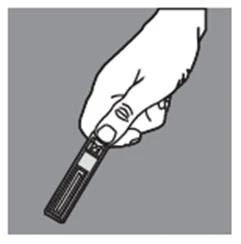 A hand holds an injection pen tilted downward to prepare the