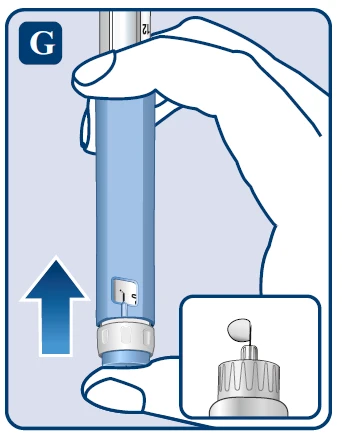 A hand holding a blue injection pen with an arrow pointing away