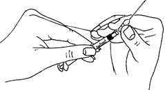 Two hands holding a syringe with a needle to prepare or administer a drug by injection