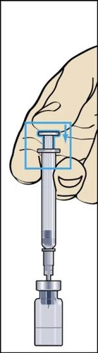 A hand holds a syringe with a plunger being pushed downward to draw liquid from a transparent glass vial