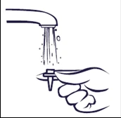 A hand holds a small bottle under an open tap with water flowing