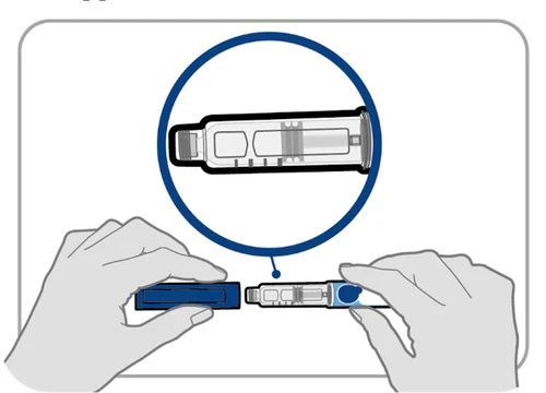 Two hands connecting a blue injection device to a transparent syringe with a circular magnification showing syringe details