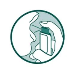 Circular illustration showing a hand holding a medical device near the profile of a face for the